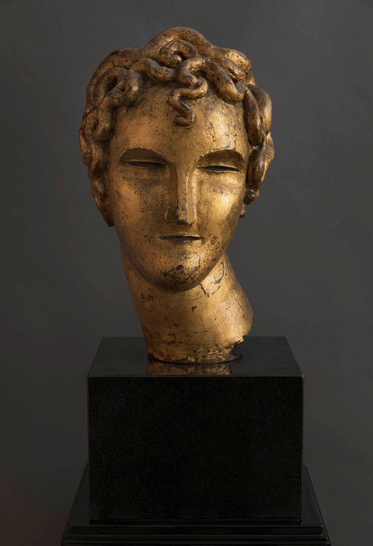 
		                					Elie Nadelman		                																	
																											<i>Head of a Boy,</i>  
																																								ca. 1912-13, 
																																								gilt bronze, 
																																								16 3/4 inches ht 
																								
		                				