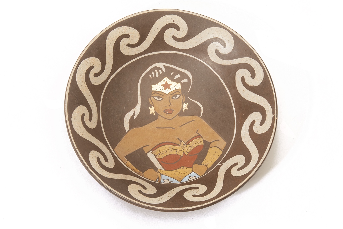 
		                					Diego Romero		                																	
																											<i>Wonder Woman,</i>  
																																								2002, 
																																								earthenware, 
																																								 2 1/4 x 8 7/8 (diameter) inches 
																								
		                				