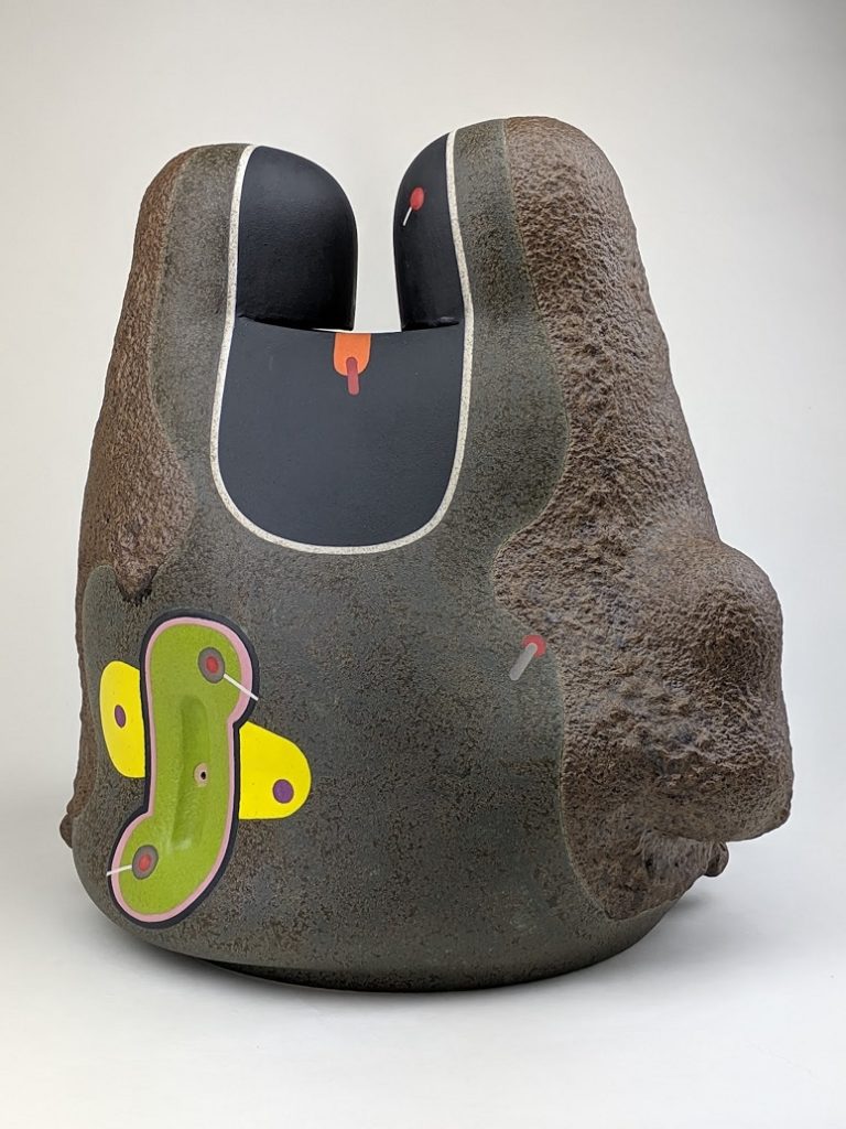 grey, green and yellow stoneware sculpture by Jose Sierra