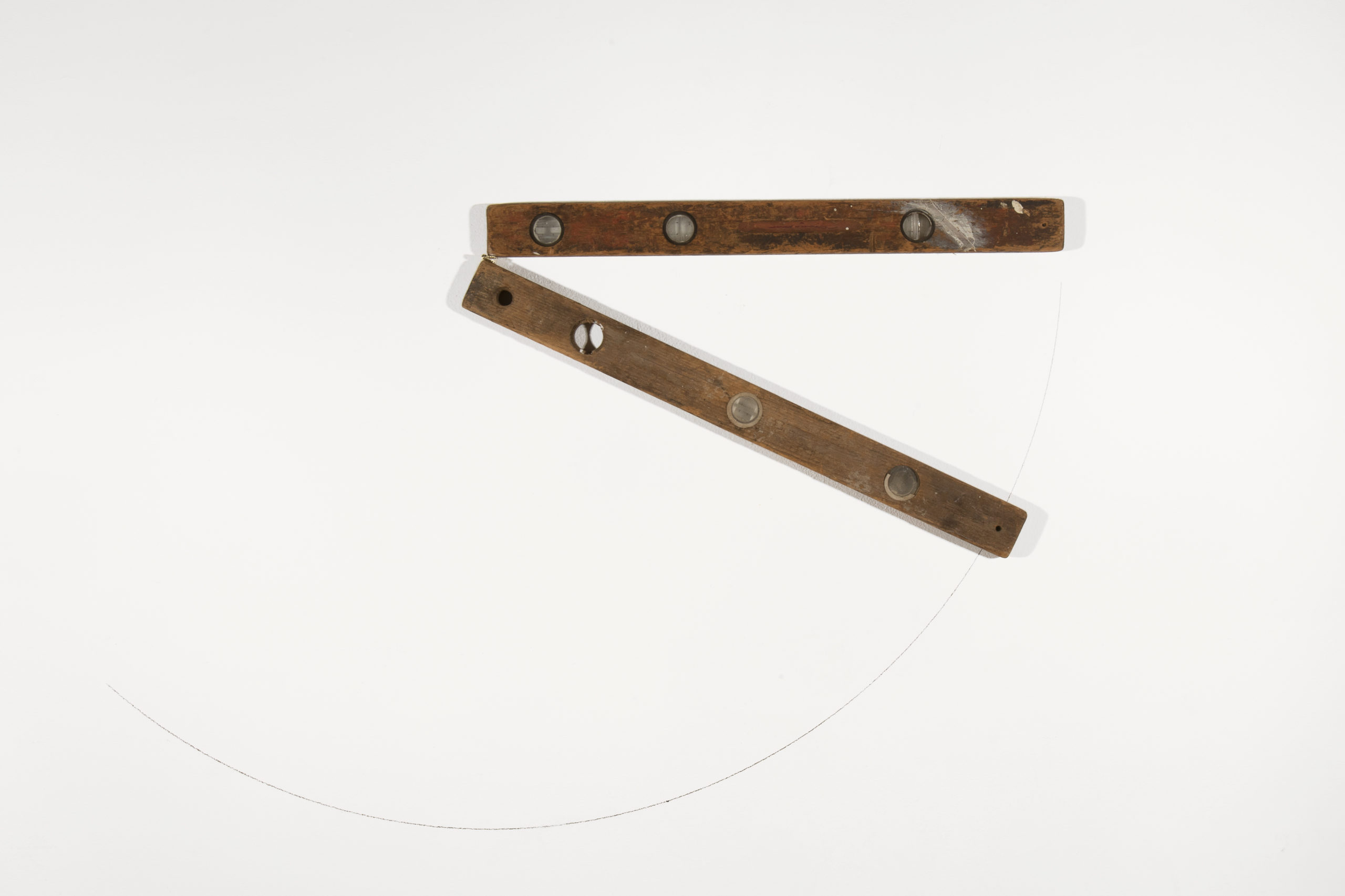 
		                					Eric Garduño		                																	
																											<i>3:20,</i>  
																																								2022, 
																																								antique levels and graphite on the wall, 
																																								dimensions variable 
																								
		                				