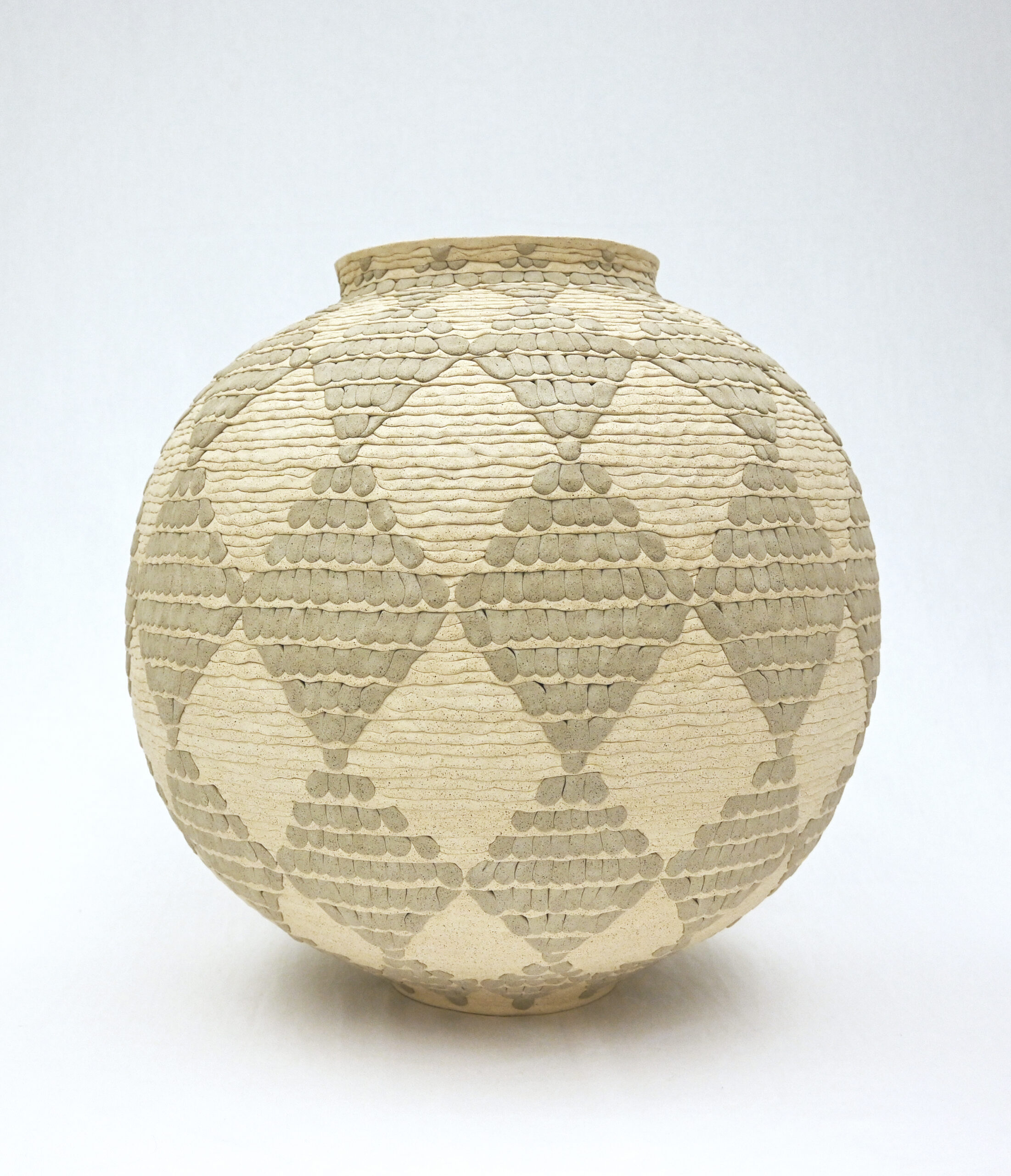 
							

									YoonJee Kwak									Patterned Memories, Moon-jar inspired vessel III 2024									Hand-built stoneware, colored stoneware<br />
18 x 18 x 18 inches									


							
