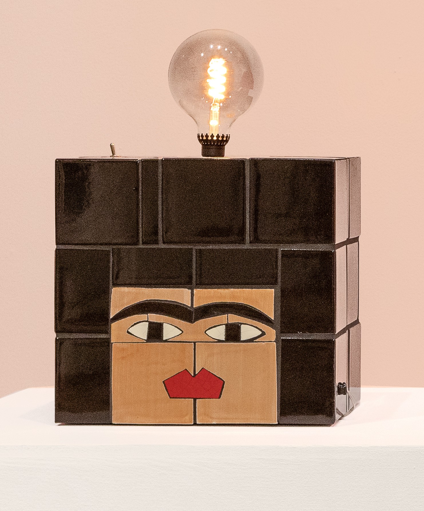 
							

									Esther Elia									Tre Pata Ashureta Lamp 2023									Mexican tile, grout, epoxy, and plywood<br />
13 x 14 x 9 1/2 inches									


							