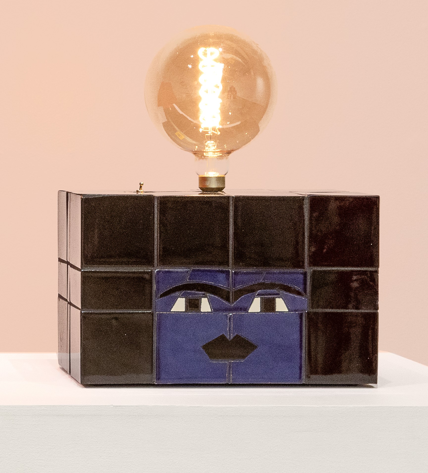 
							

									Esther Elia									Milta Ashureta Lamp 2023									Mexican tile, grout, epoxy, and plywood<br />
11 x 17 x 9 1/2 inches									


							