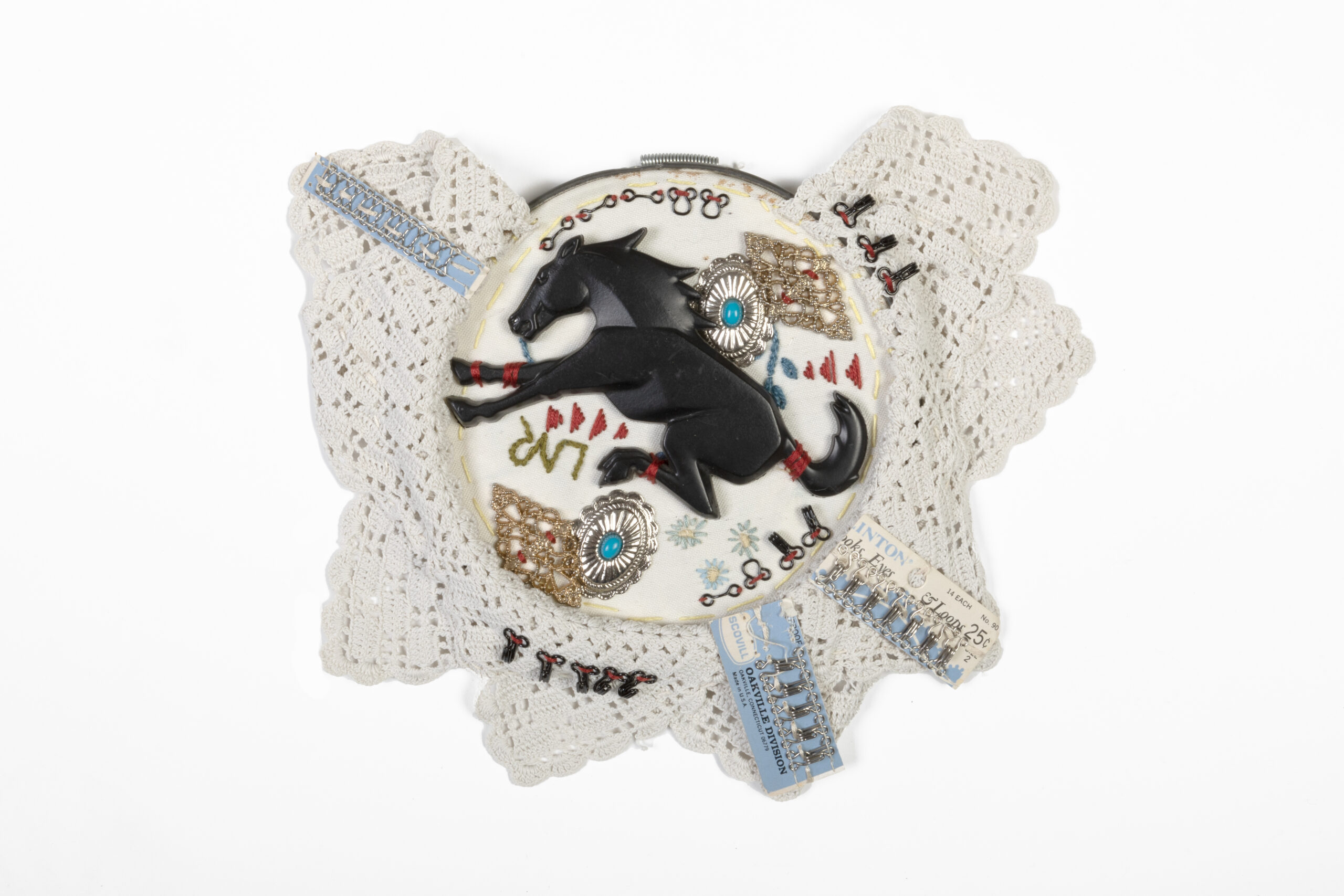 
							

									Hattie Lee Mendoza									Bronco Legacies 2022									mixed media, fiber art<br />
8 1/4 x 10 1/2 x 1/2 inches									


							
